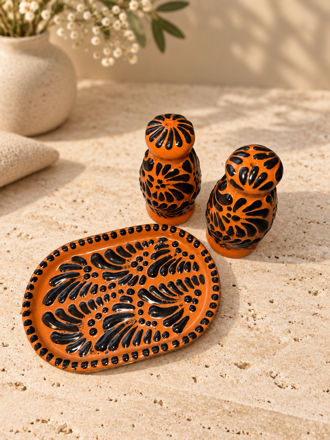 Brown and black salt and pepper shakers