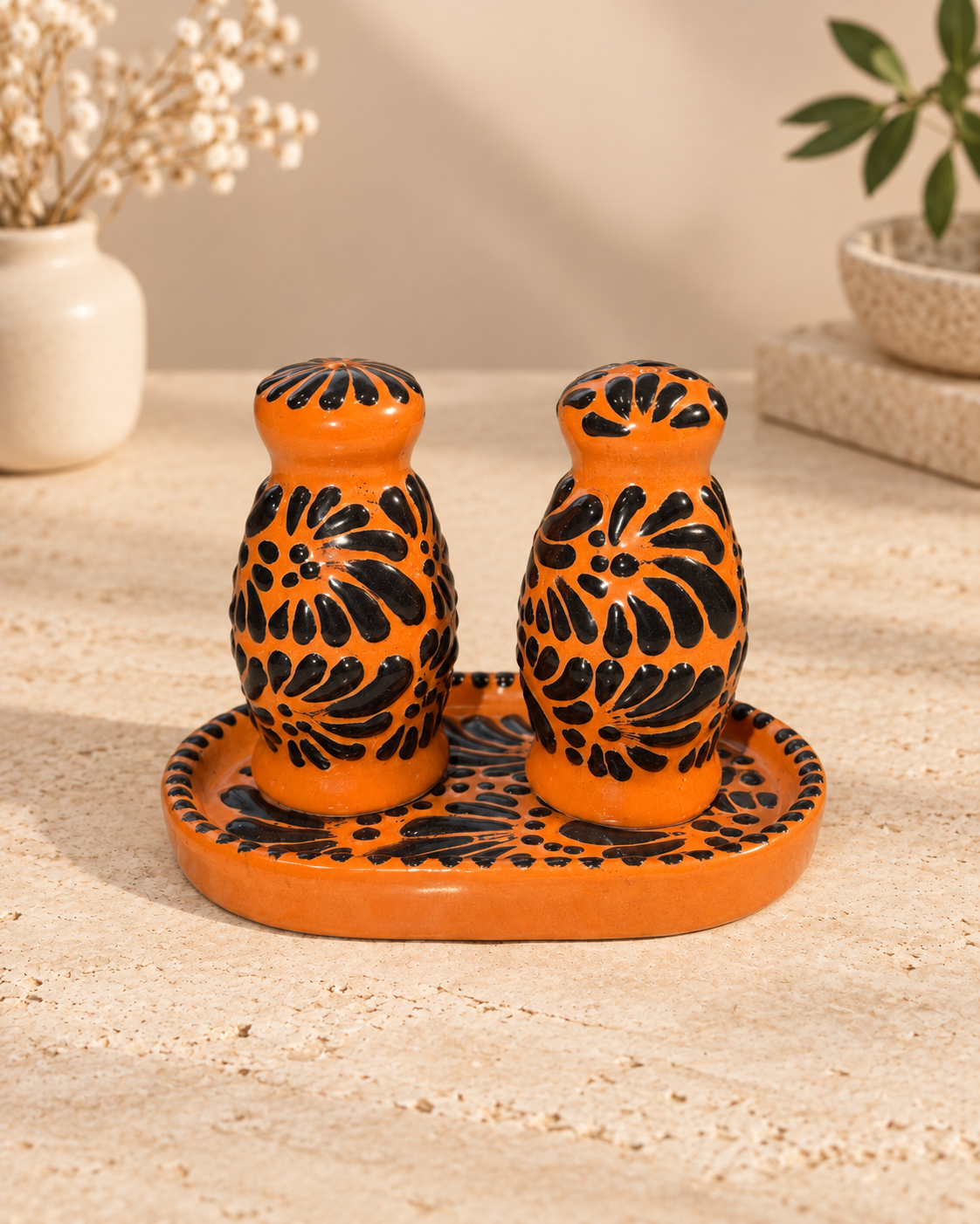 Brown and black salt and pepper shakers