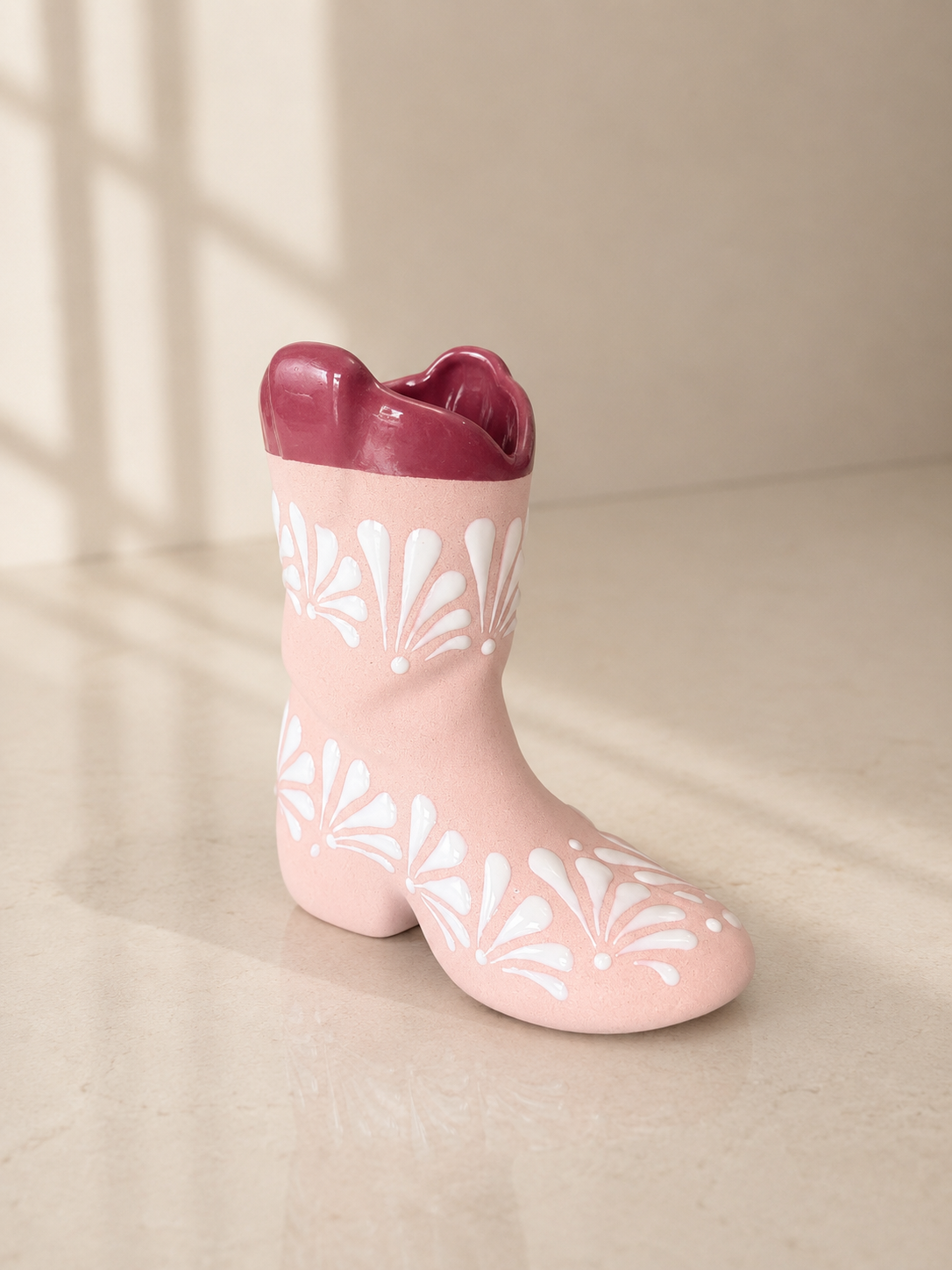 Burgundy boot flower vase