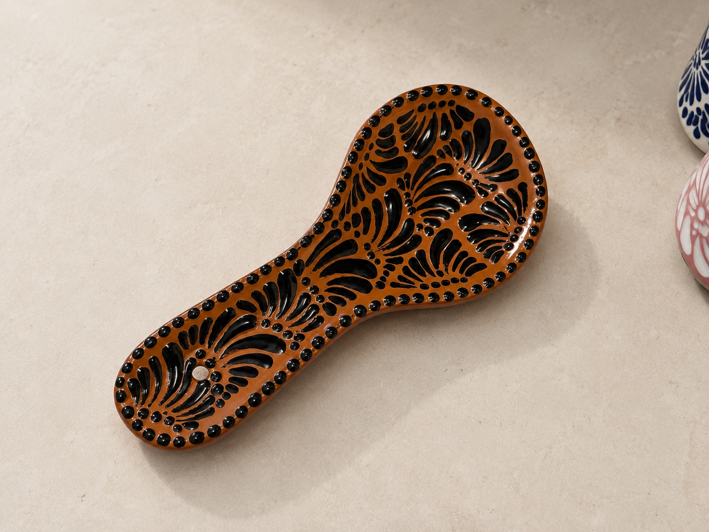 Natural and black spoon rest