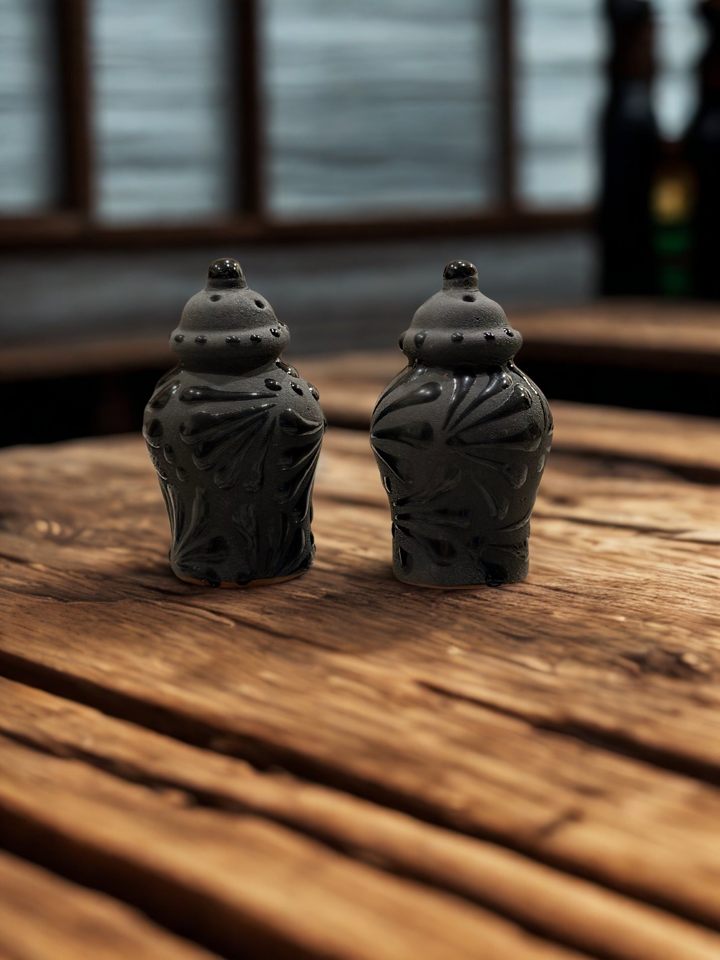 2 tall matte black shakers