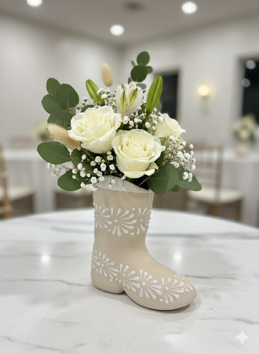 White boot flower vase