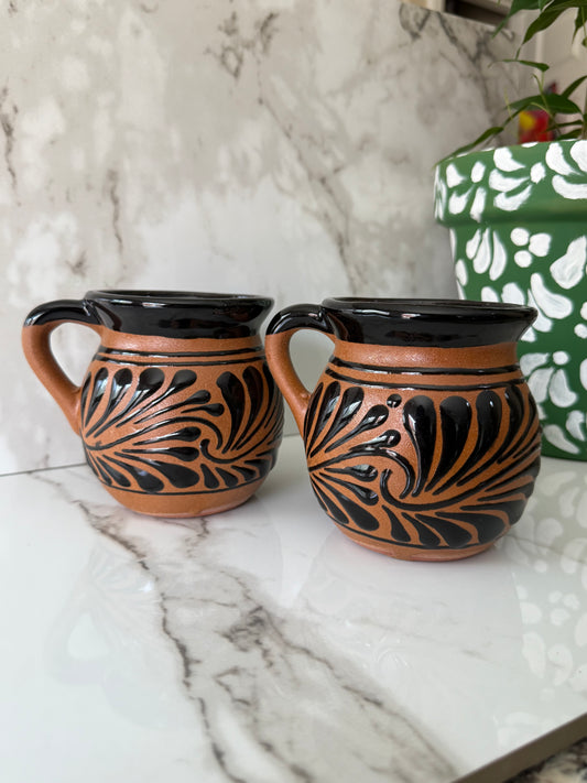 4 brown mugs
